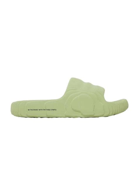 Upgrade your summer wardrobe with the new Adidas adilette 22 slides in magic lime